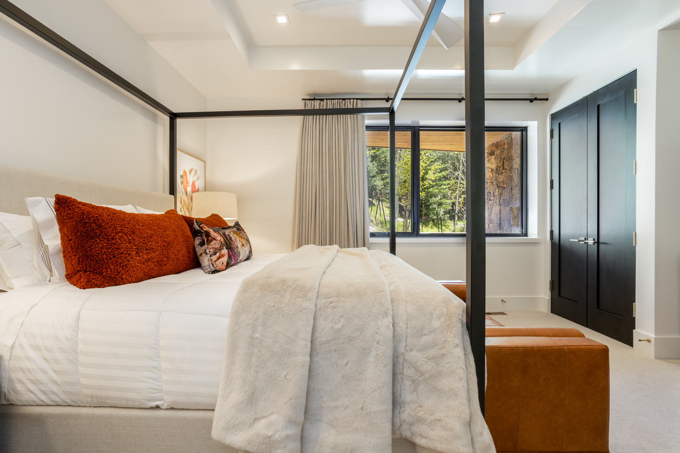 Bed toward window and closet