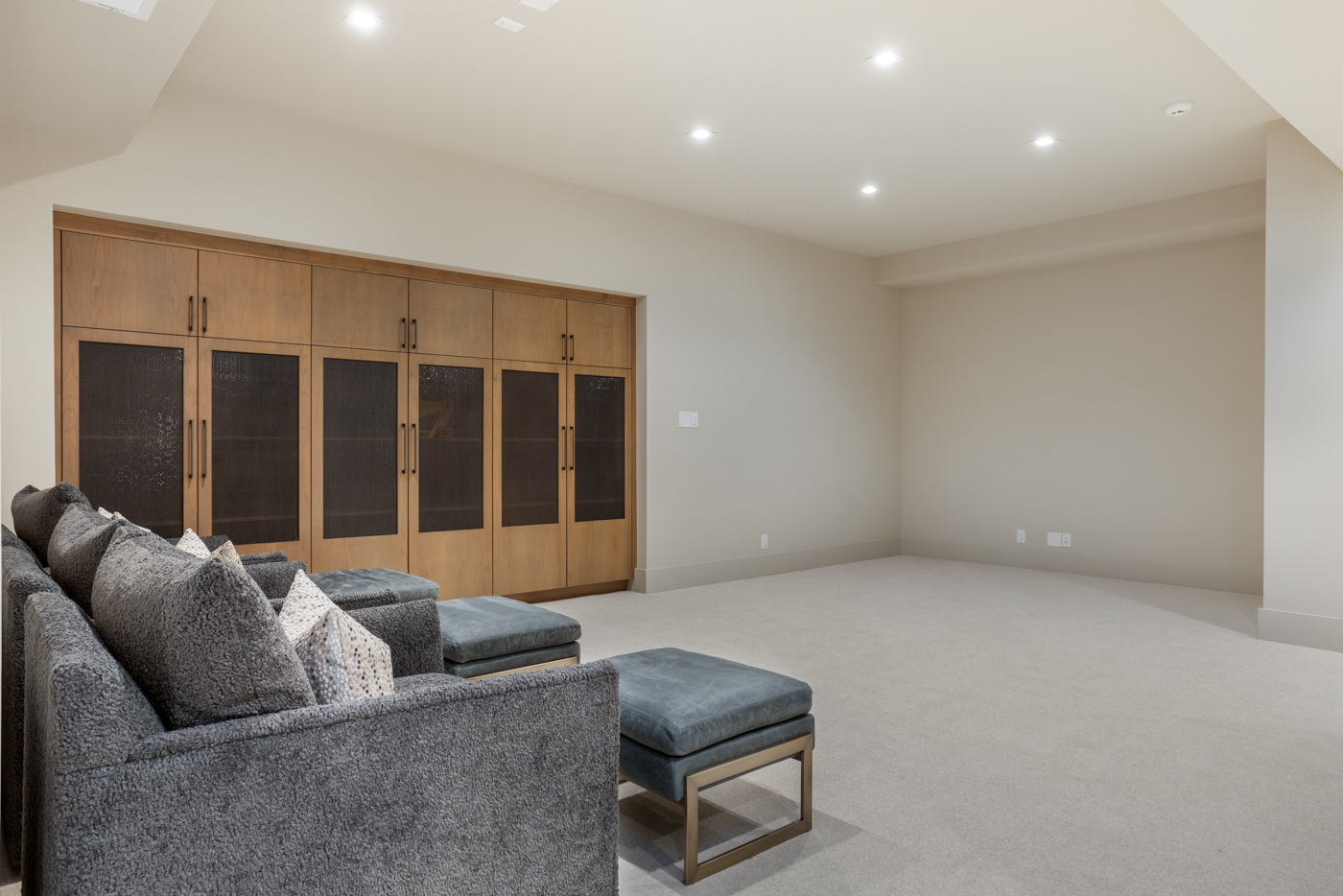 Media room with built-in cabinetry