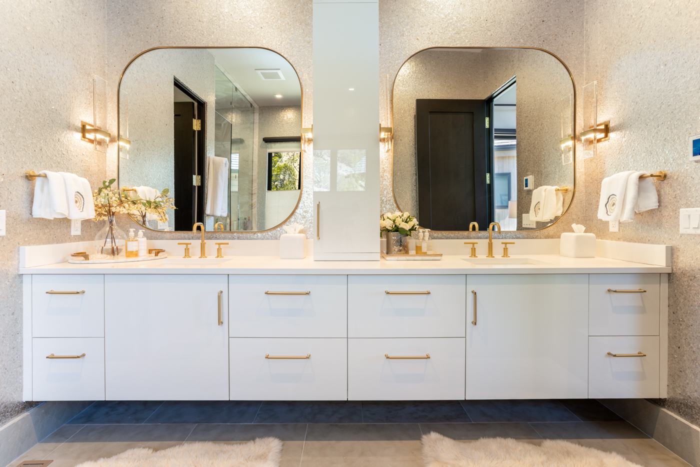 Double vanity with brass fixtures