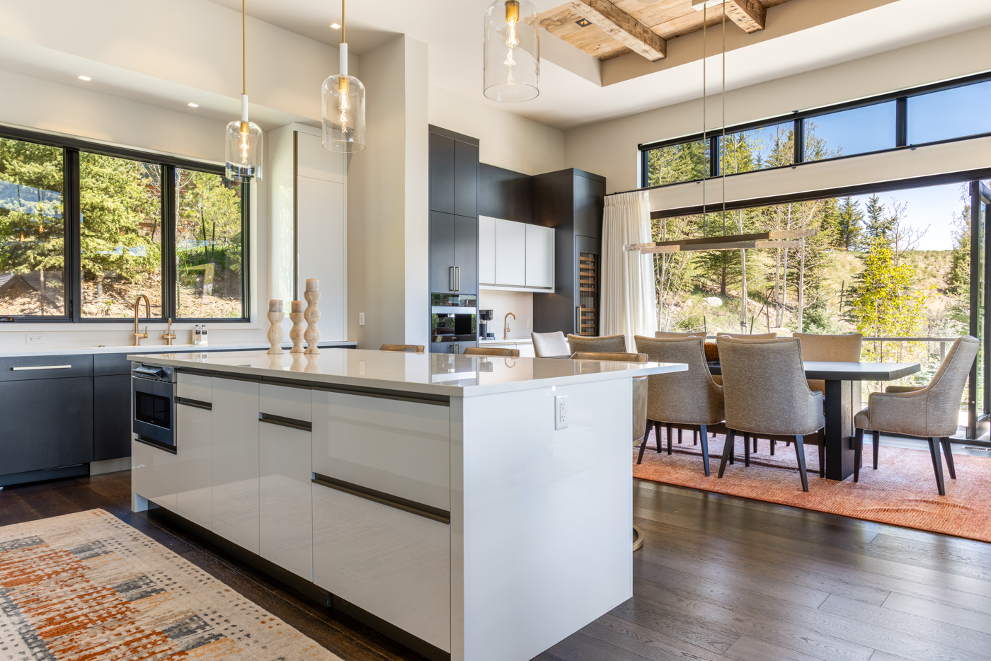 Kitchen and dining with soaring windows