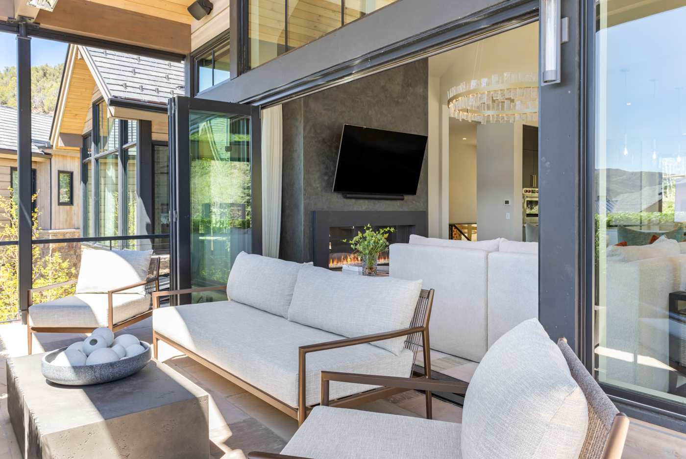 Covered terrace lounge with fireplace view