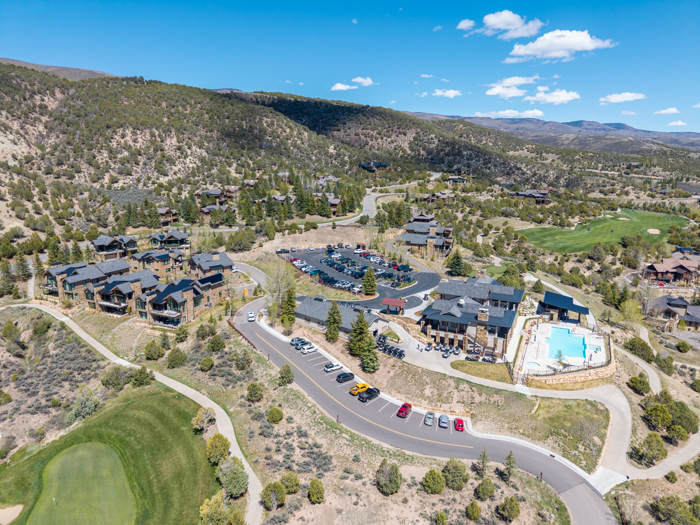Club amenities, pool, and clubhouse from above